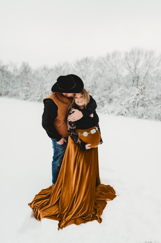 maternity snow photos of a couple in st joseph mo